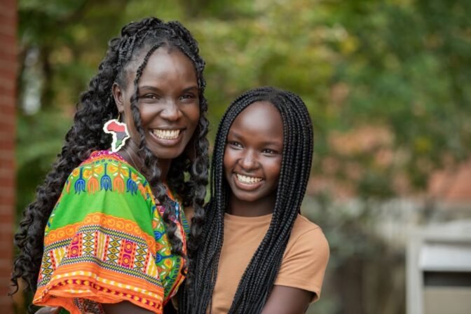 Portrait of Mother and Daughter smiling
